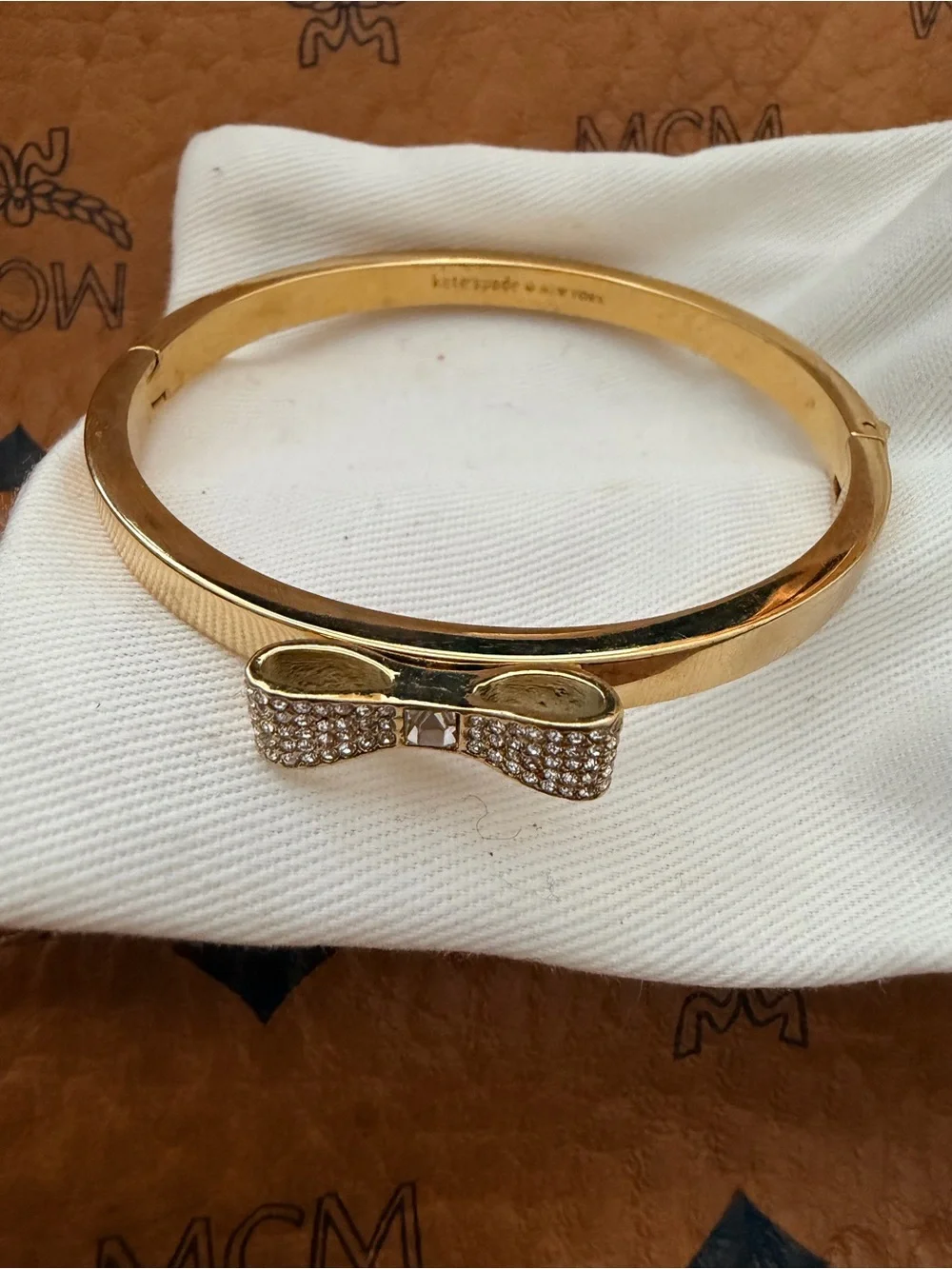 Kate Spade gold bow crystal bangle bracelet
